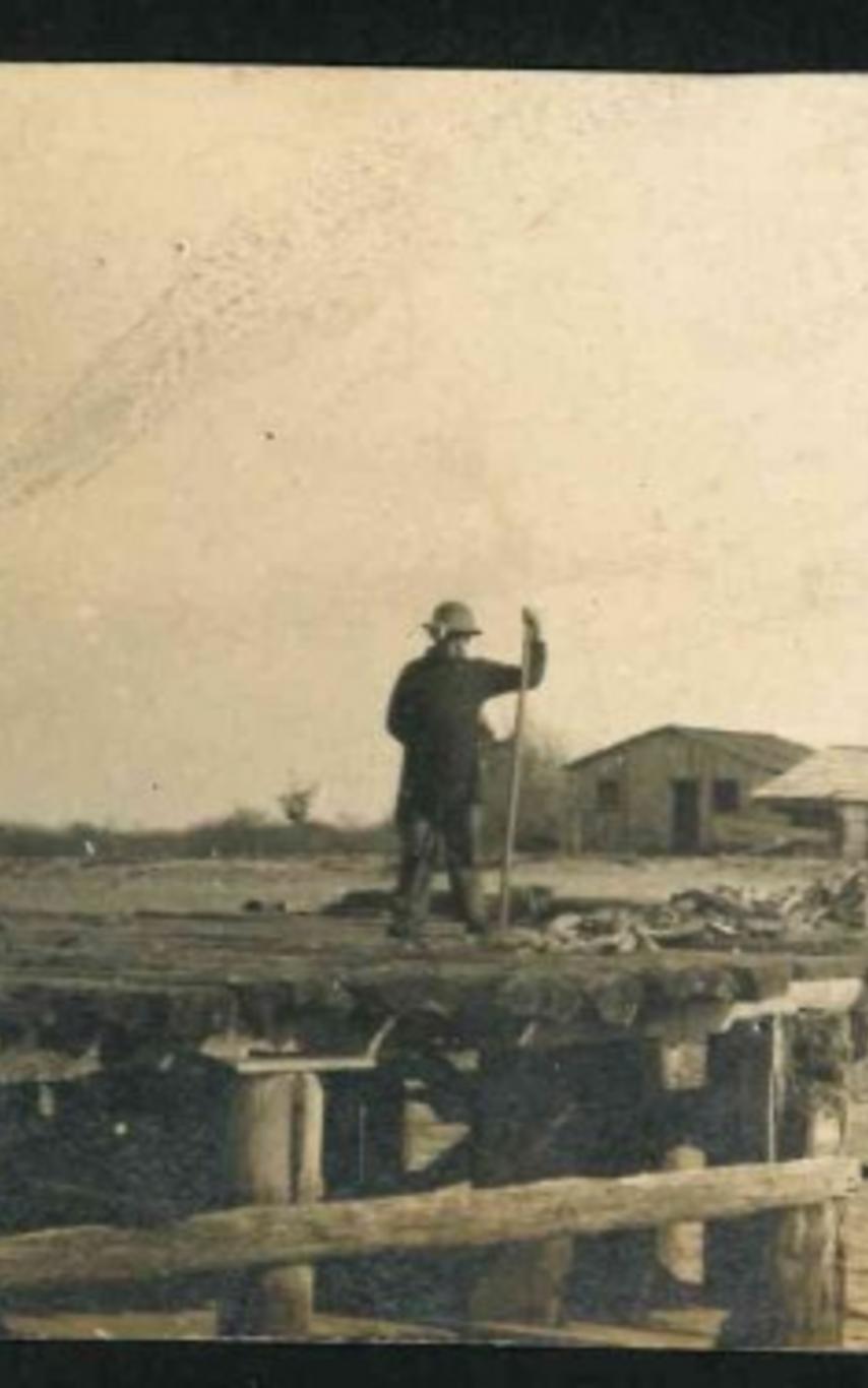 Person on dock Deep Bay QFN Archive